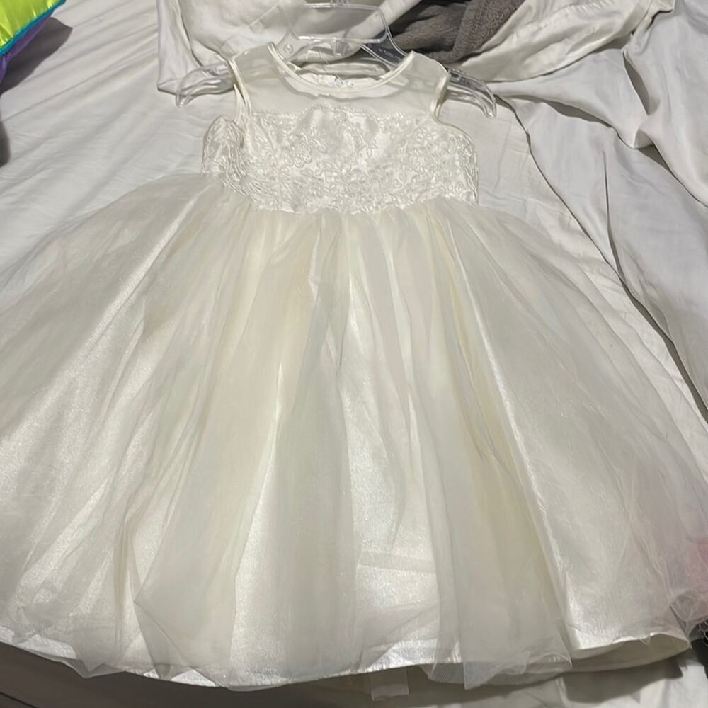 David’s Bridal 7 creamy style OP228 tulle skirt empire waist worn once guc